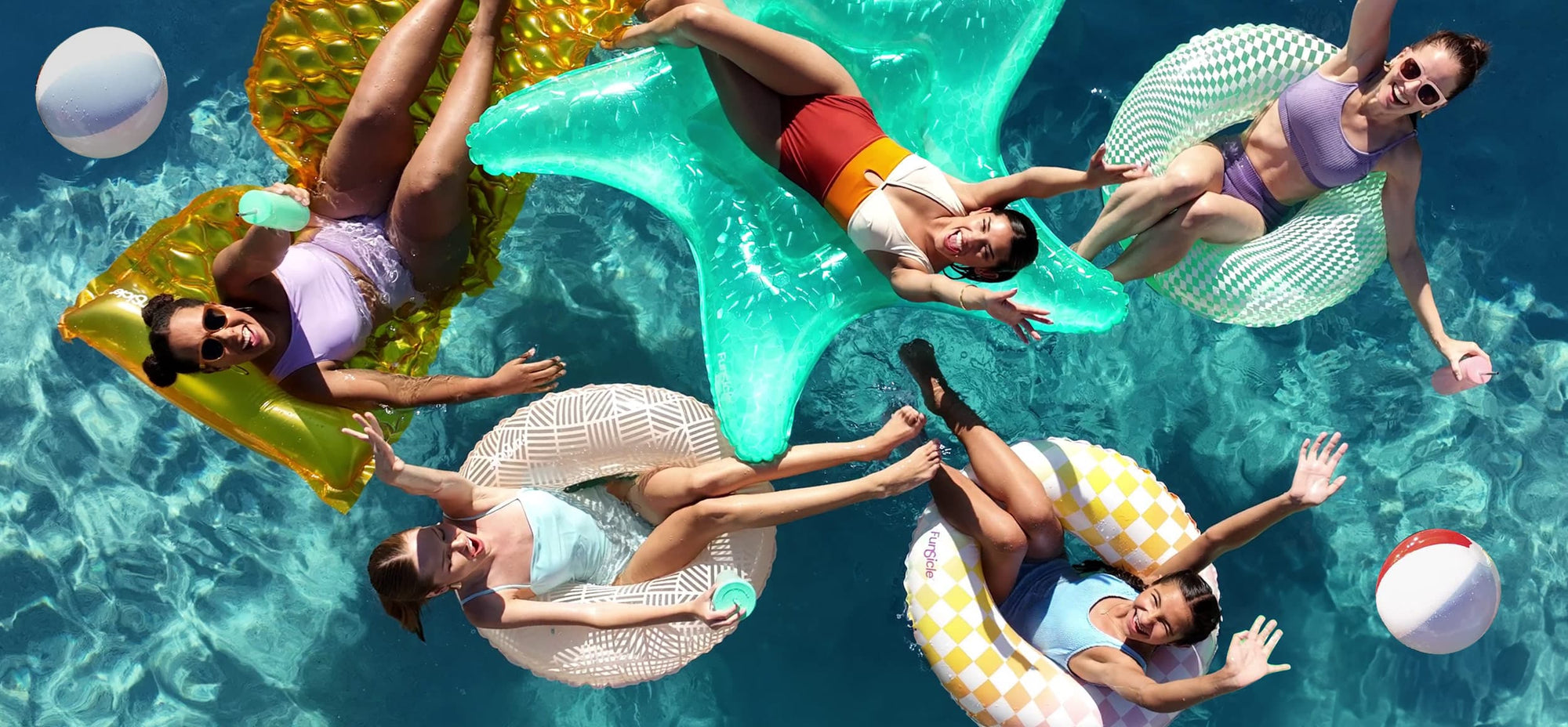 people on Funsicle floats overhead view