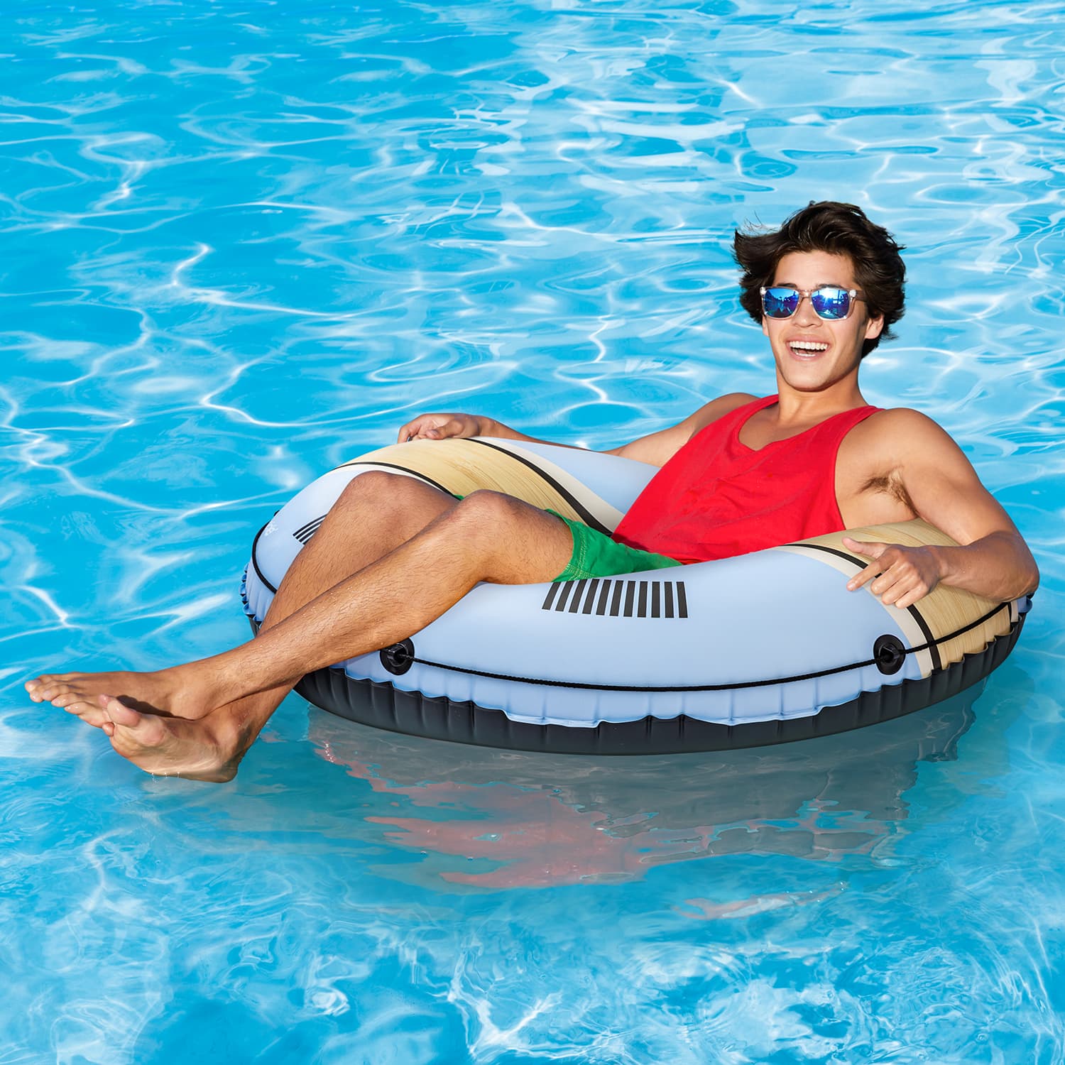 Funsicle Tahoe FunTube with a model lounging on it in a pool