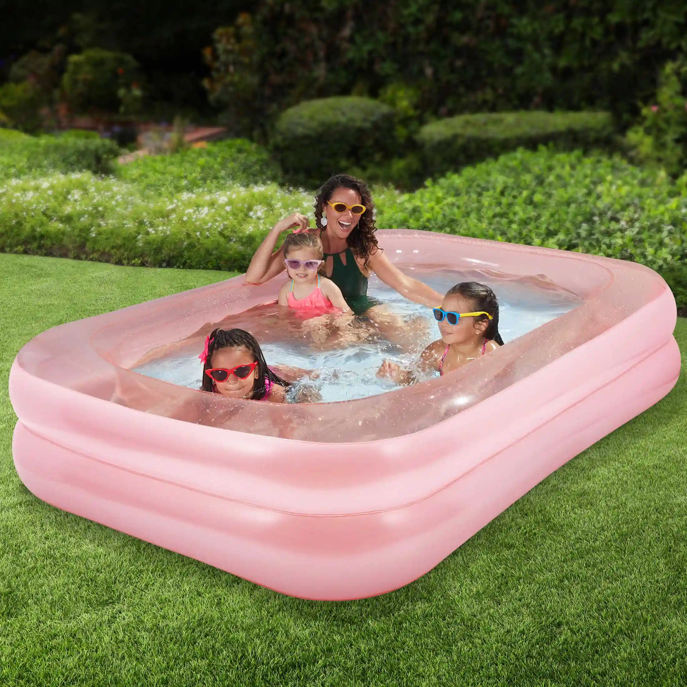 Funsicle Blissful Pool Pink with people on a grass background