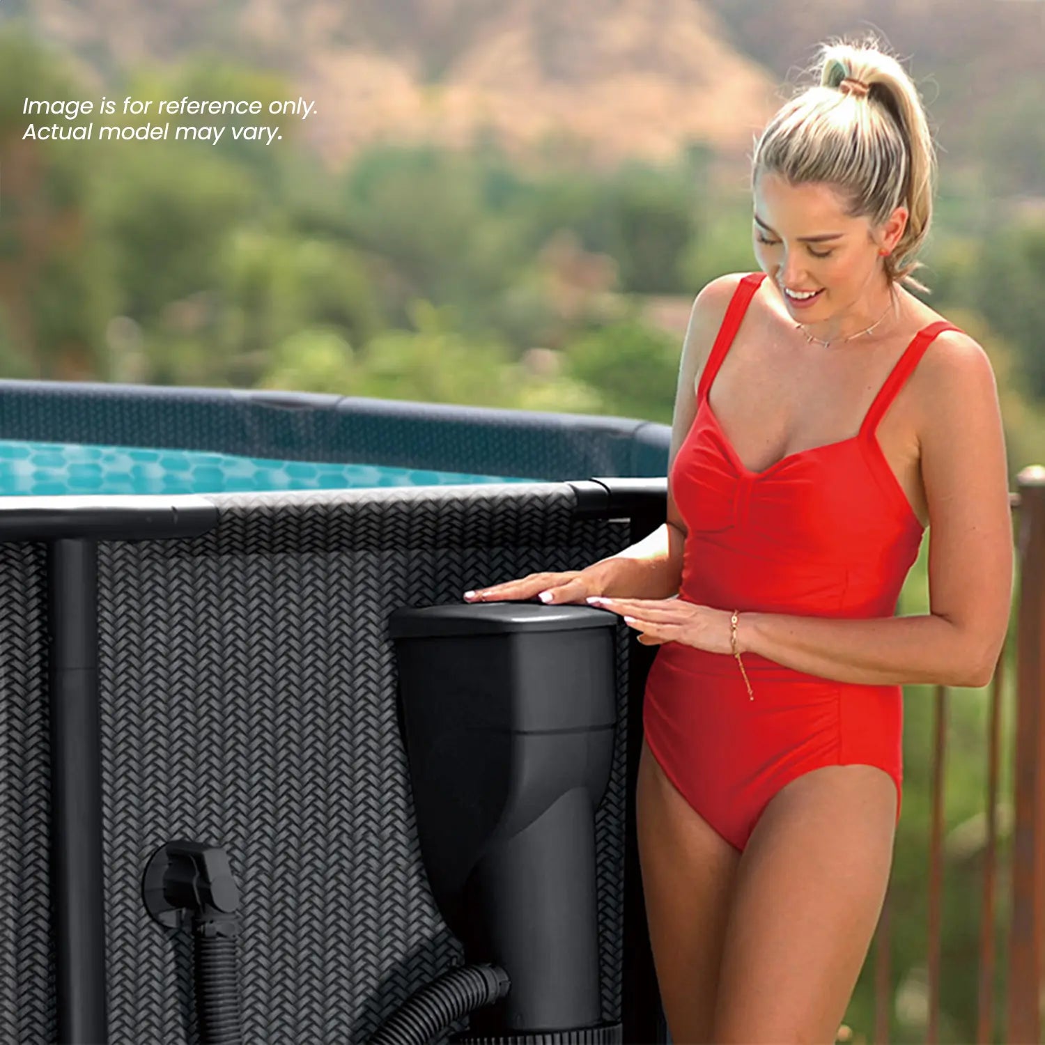 Funsicle SFX1000 SkimmerPlus Filter Pump attached to Funsicle Oasis Designer Pool with a model standing next to it