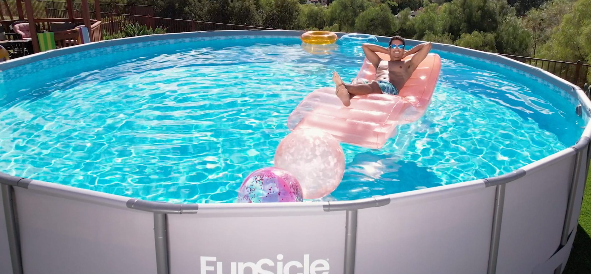 Funsicle Oasis Pool with a person on a float