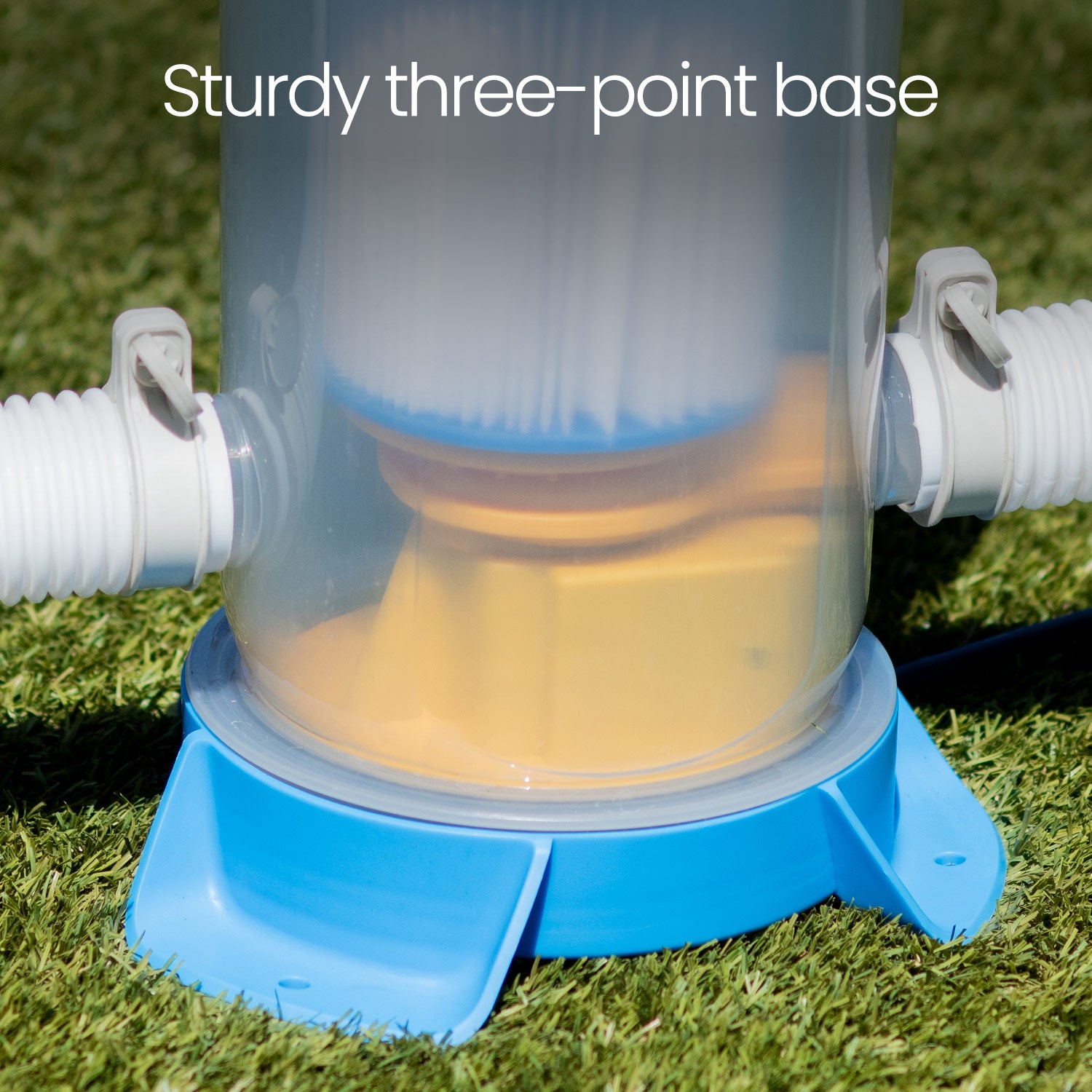 Blue and yellow pool filter on grass with text 'Sturdy three-point base'.