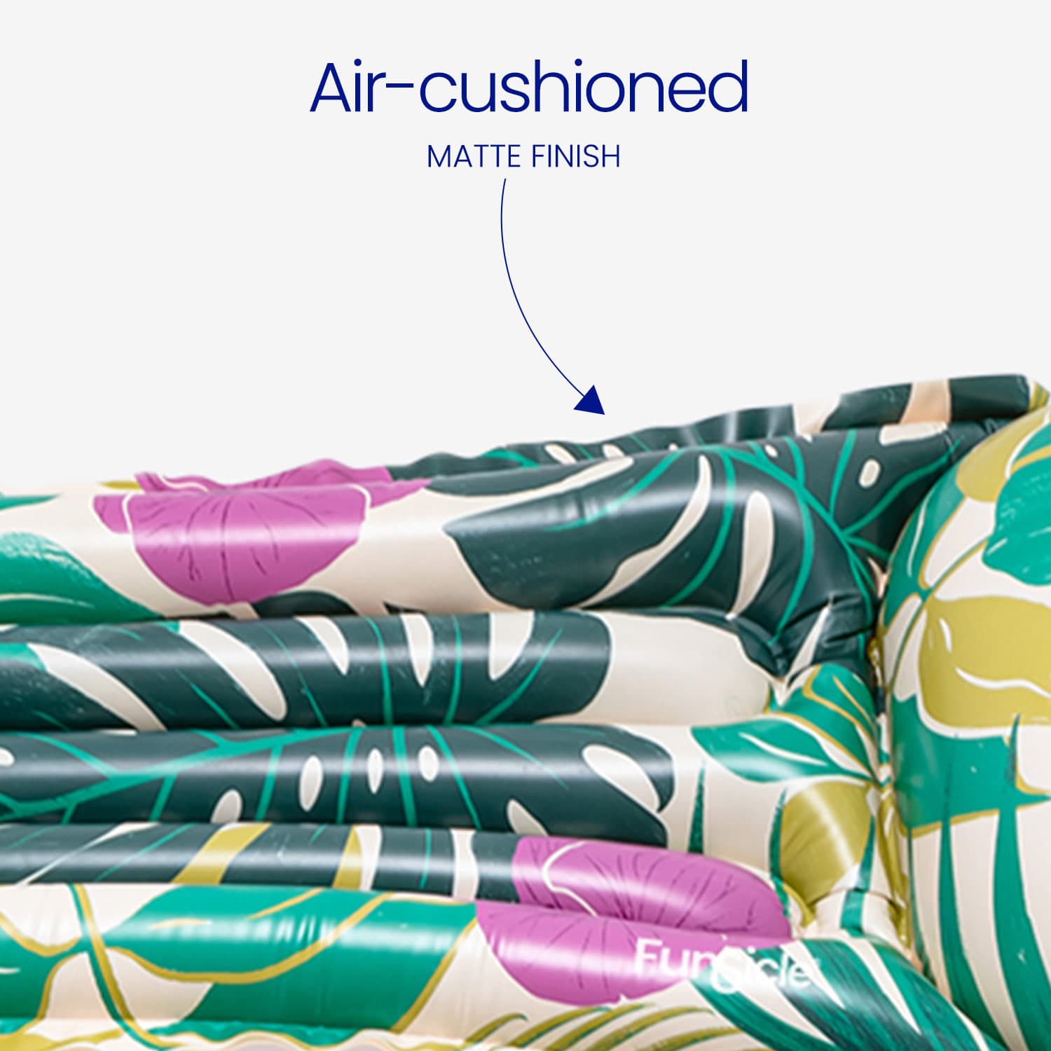 Inflatable sofa with leaf pattern and 'Funsicle' branding on a white background