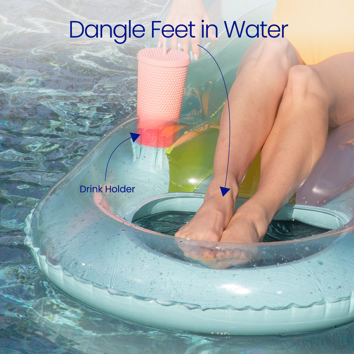 Inflatable pool float with drink holder and feet dangling in water