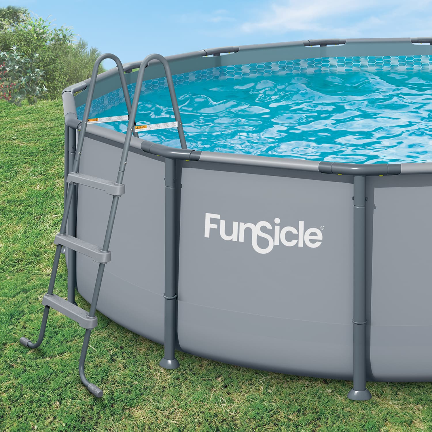 Funsicle above-ground pool with ladder on grass