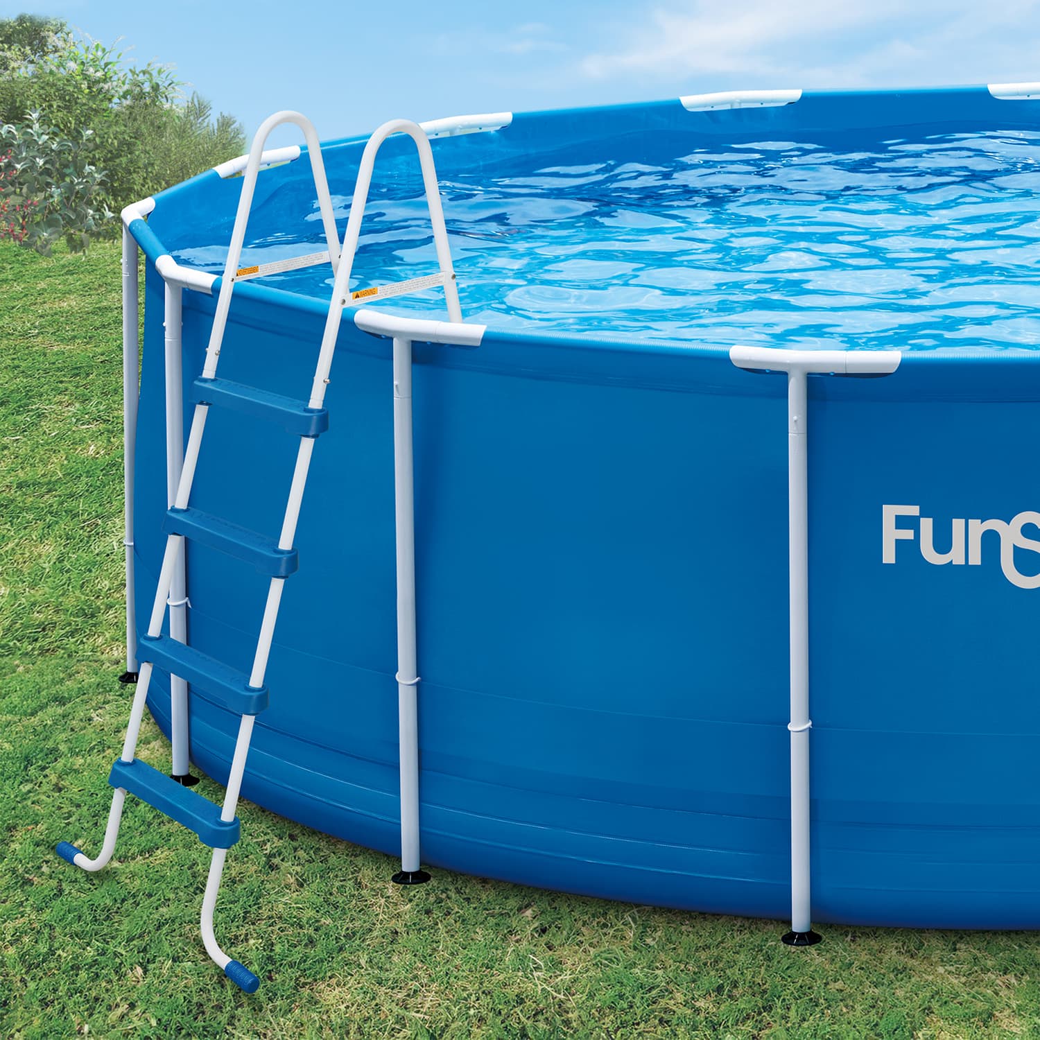 Blue above-ground pool with white ladder on grass