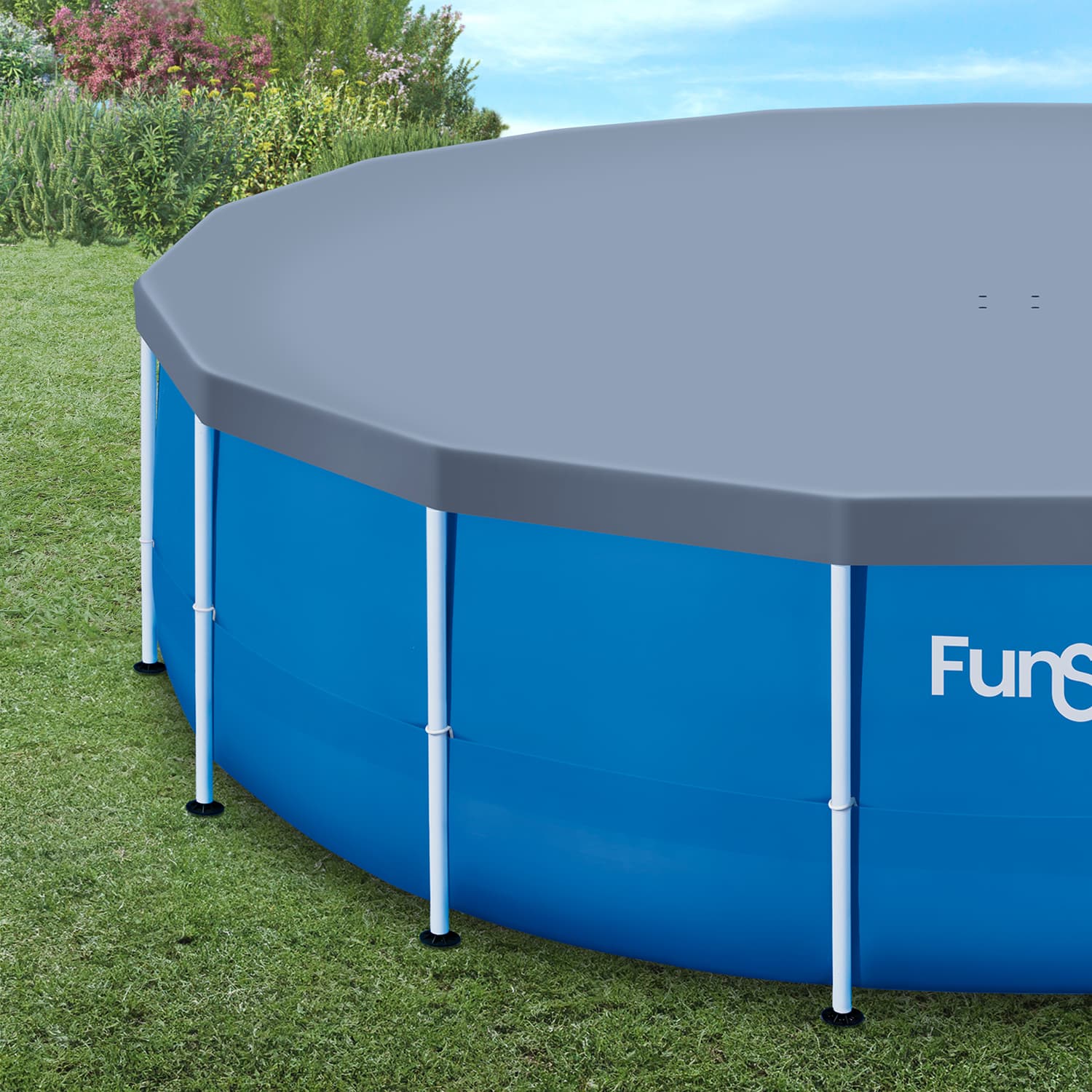 Blue above-ground pool with a gray cover on grass