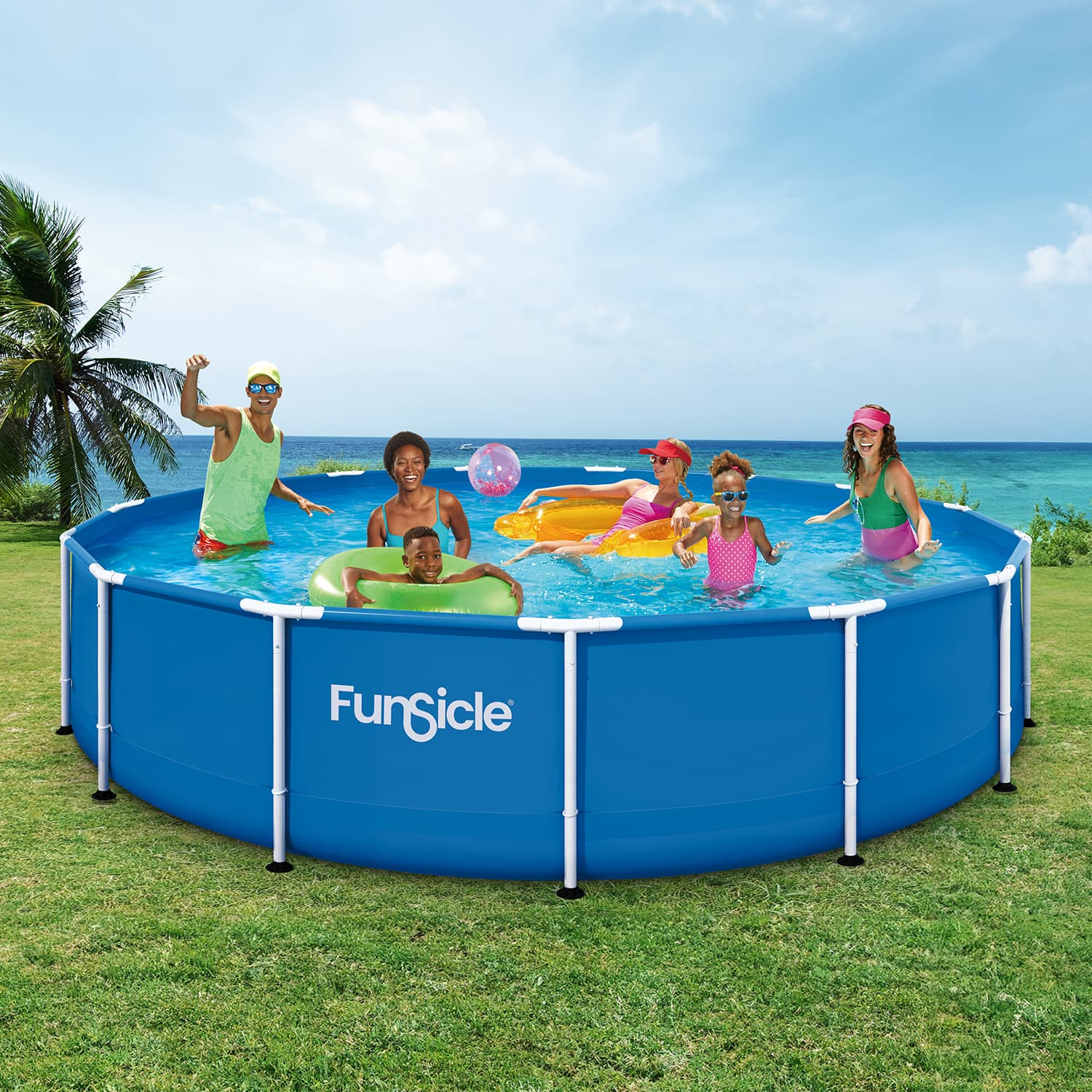 Children playing in a blue Funsicle pool outdoors with ocean and palm trees in the background.