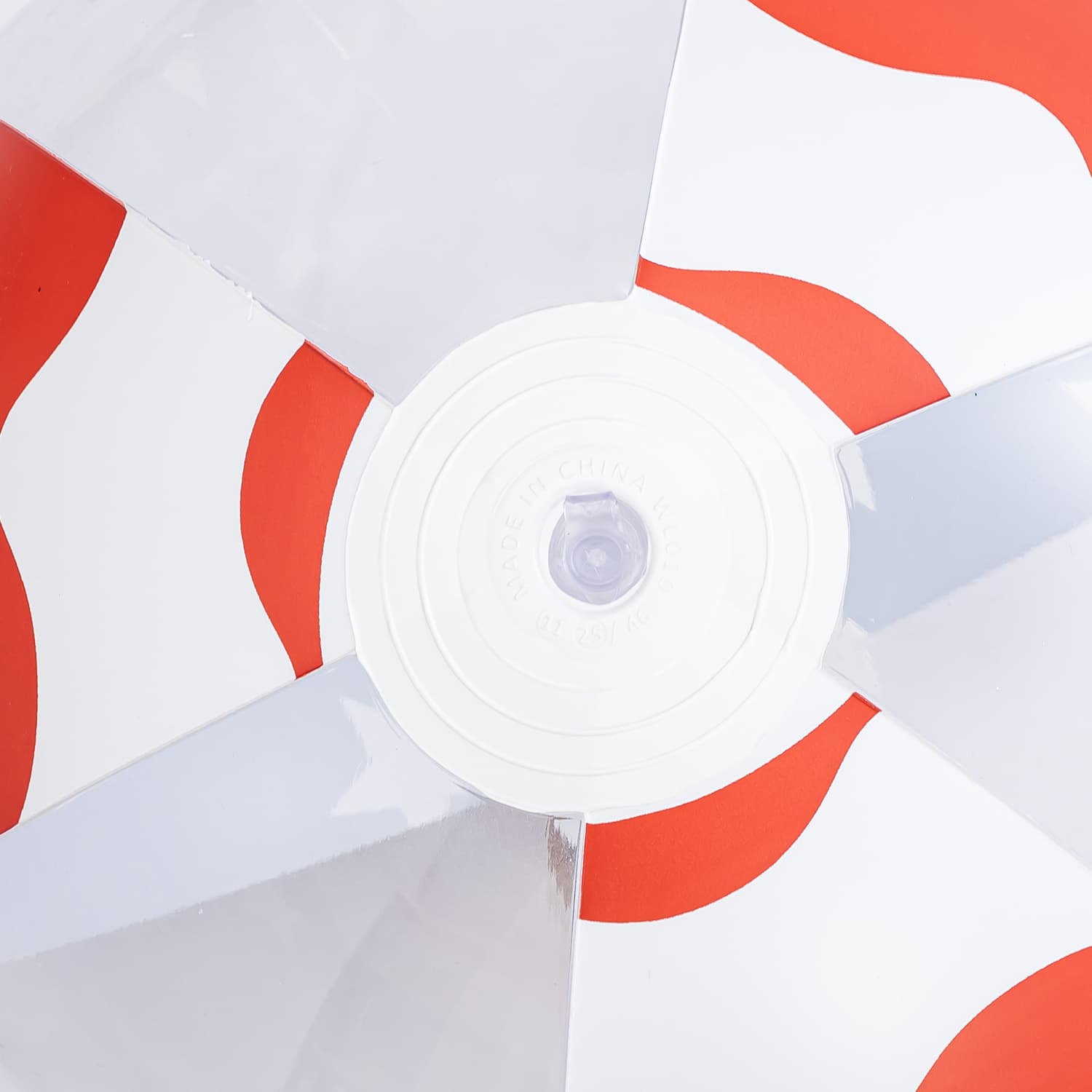 Close-up of a red and white striped Funsicle Americana Fun Ball