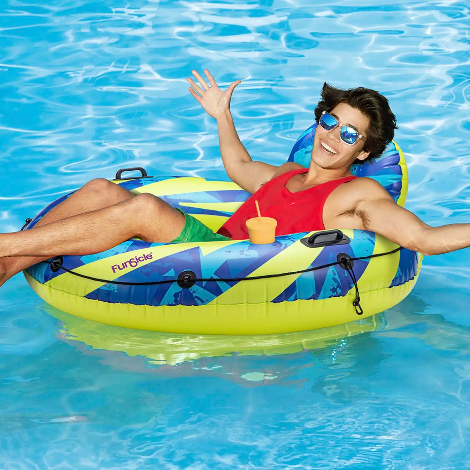 a model lounging on Funsicle Rolling River FunTube in a pool