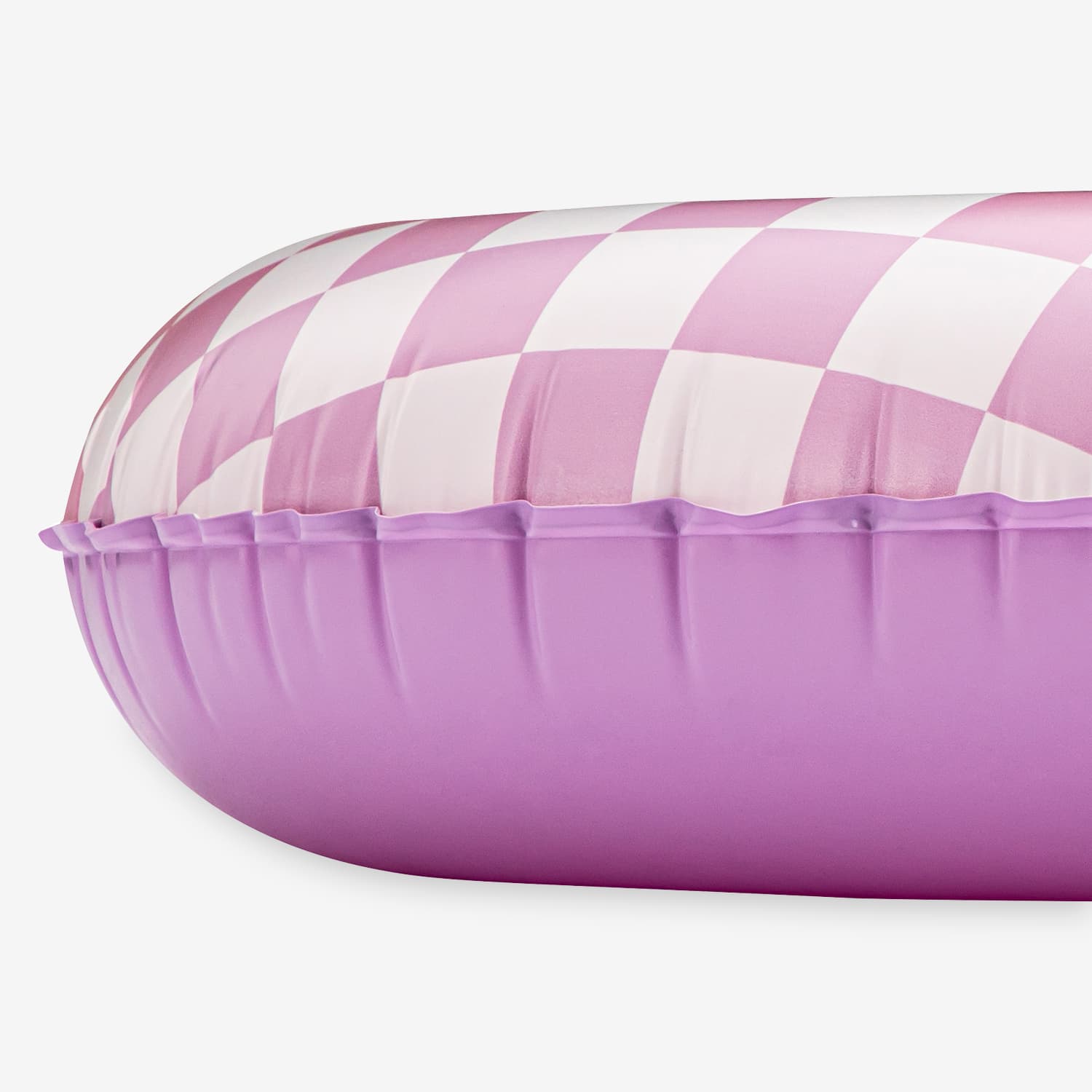 Inflatable pool float with pink and white checkered top on a white background