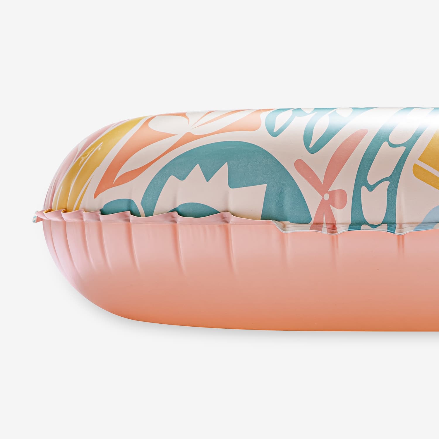 Inflatable pool float with floral pattern on a white background
