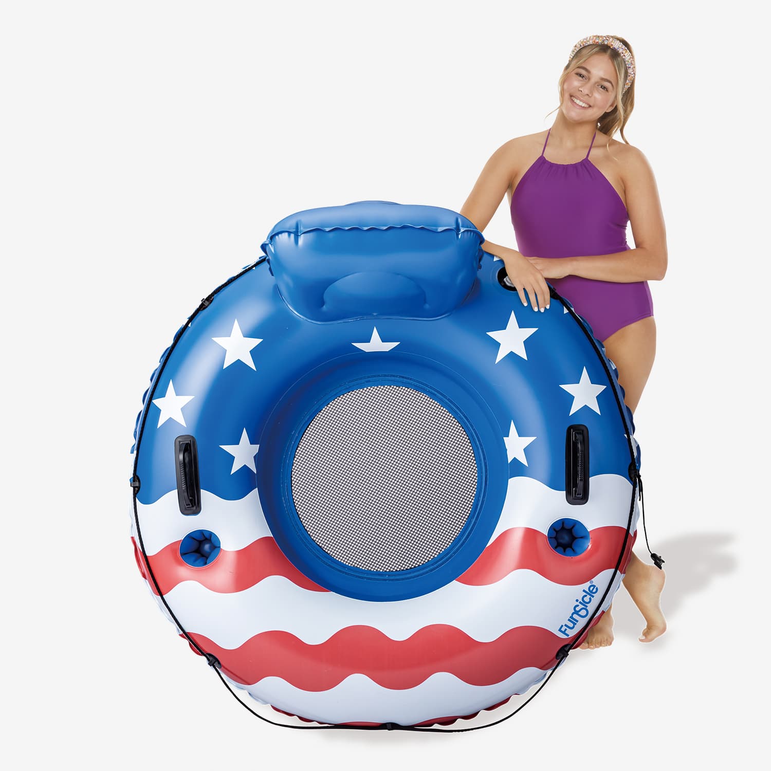 Woman holding a large inflatable pool float with American flag design on a white background