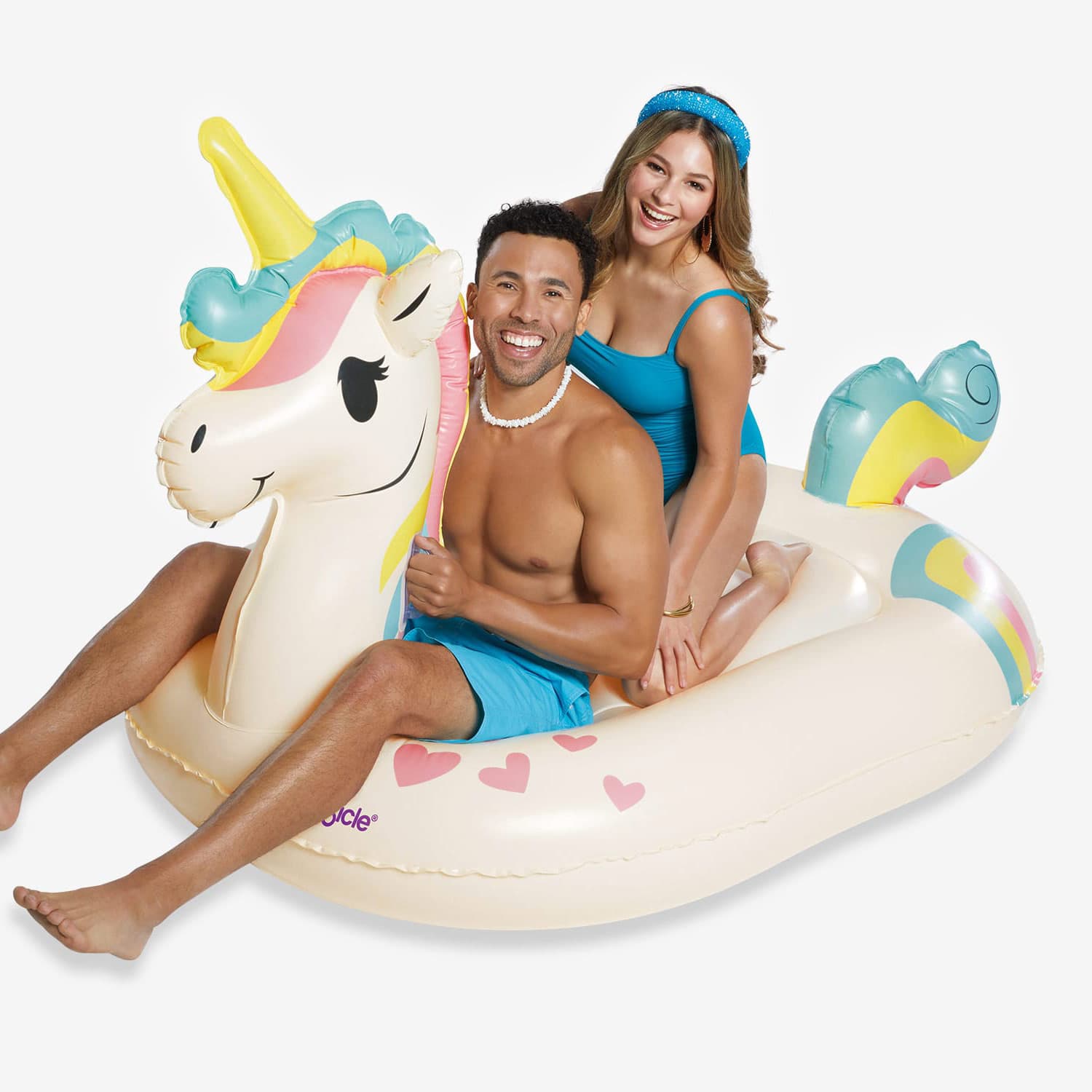 models riding Funsicle Unicorn Magic Ride-On