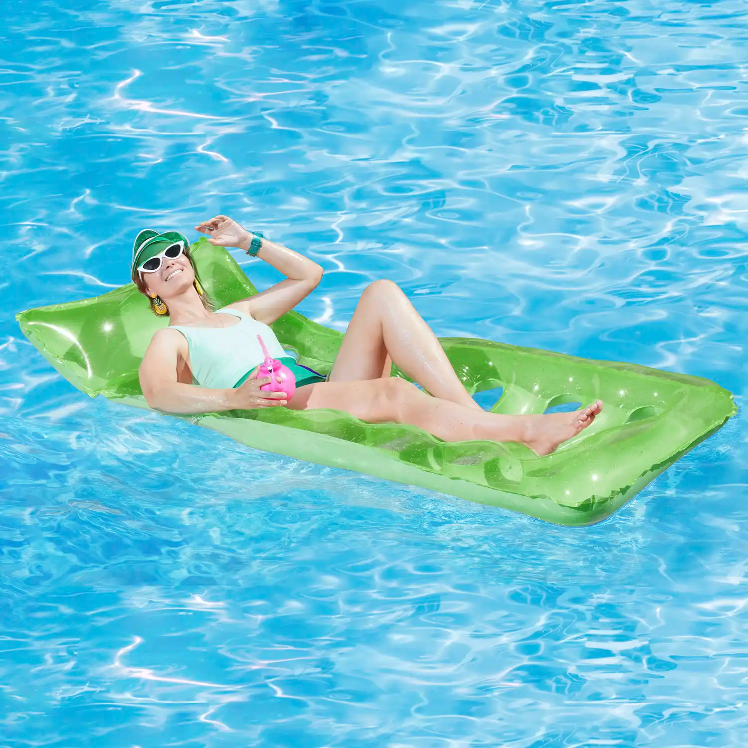 a model lounging. on Funsicle Cool Sunbather Mat