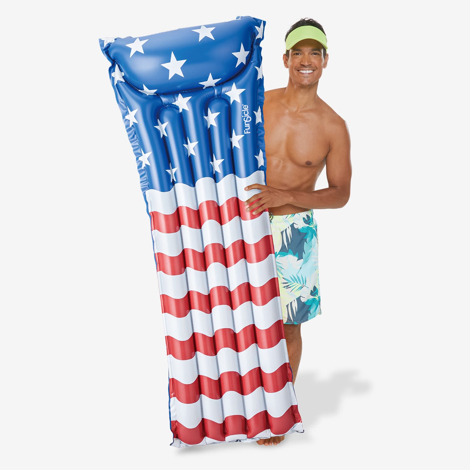 Man holding an inflatable American flag pool float on a white background