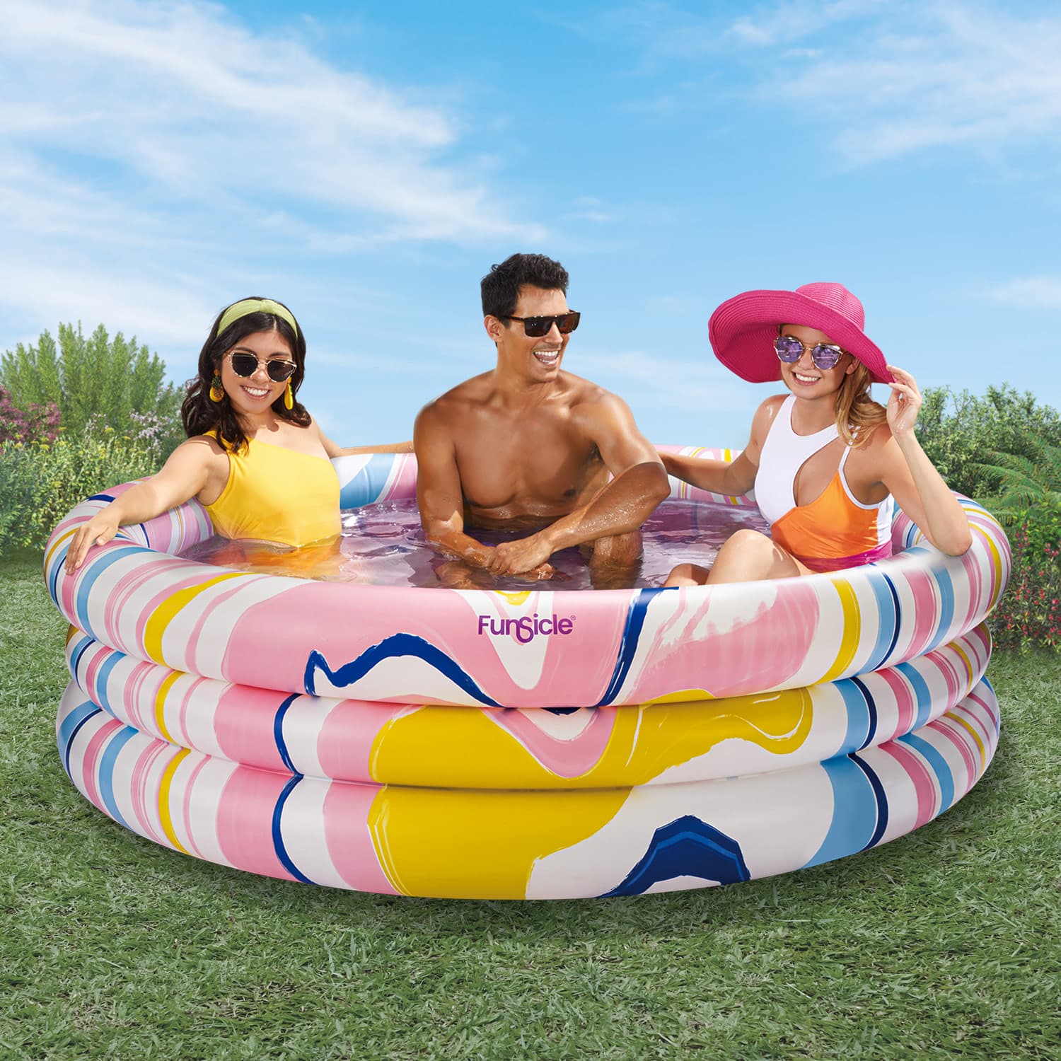 Funsicle Dream Swirl Pool with models in the backyard