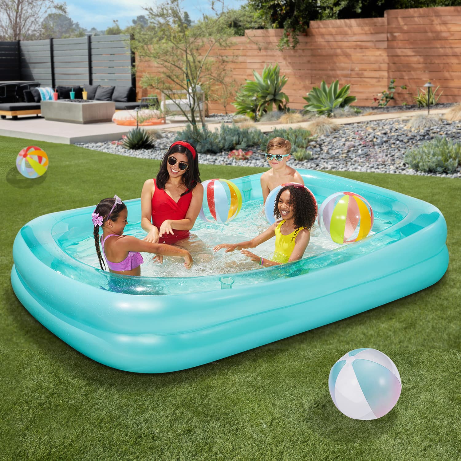 Funsicle Blissful Pool with models in the backyard