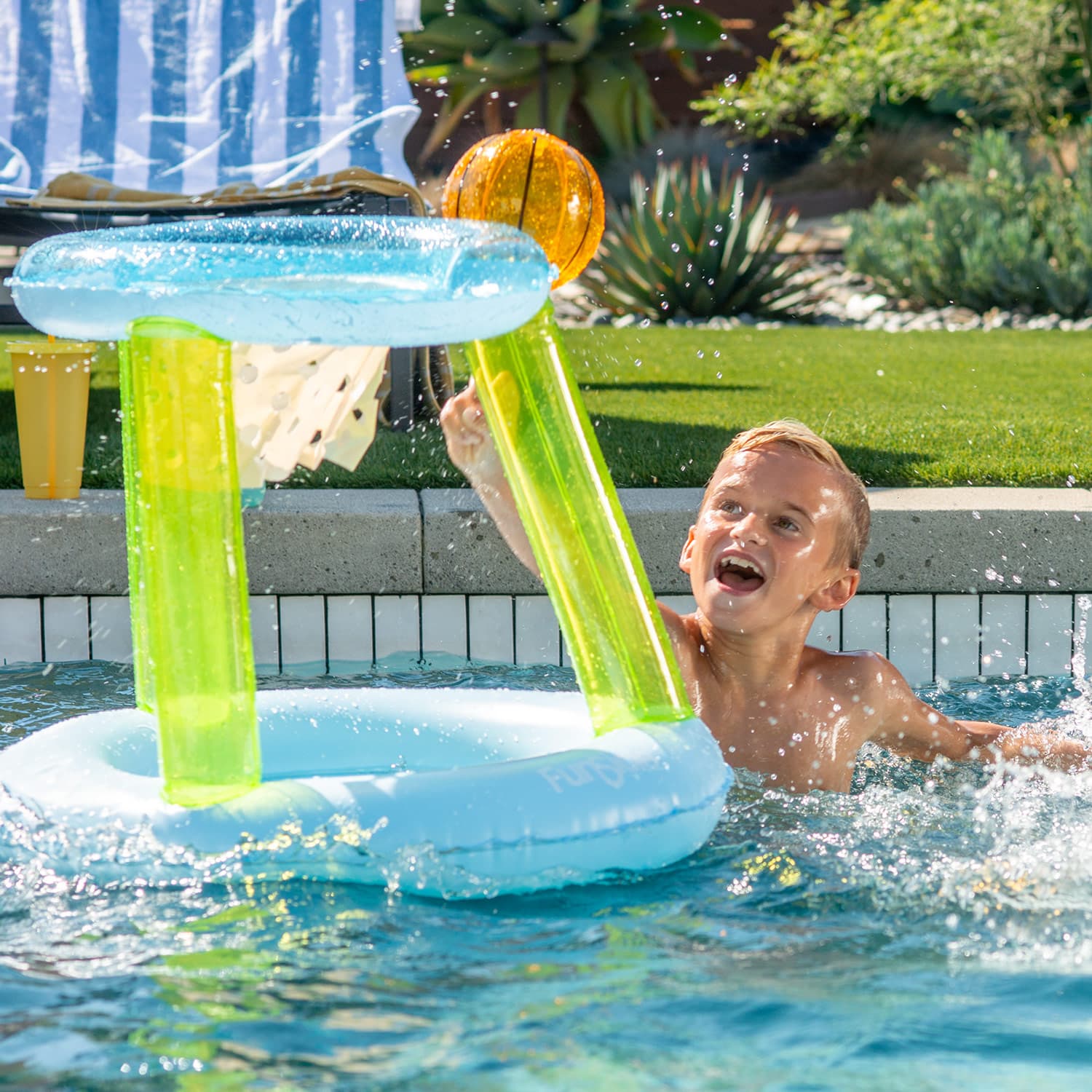 Funsicle Floating Basketball Set with a model in a pool