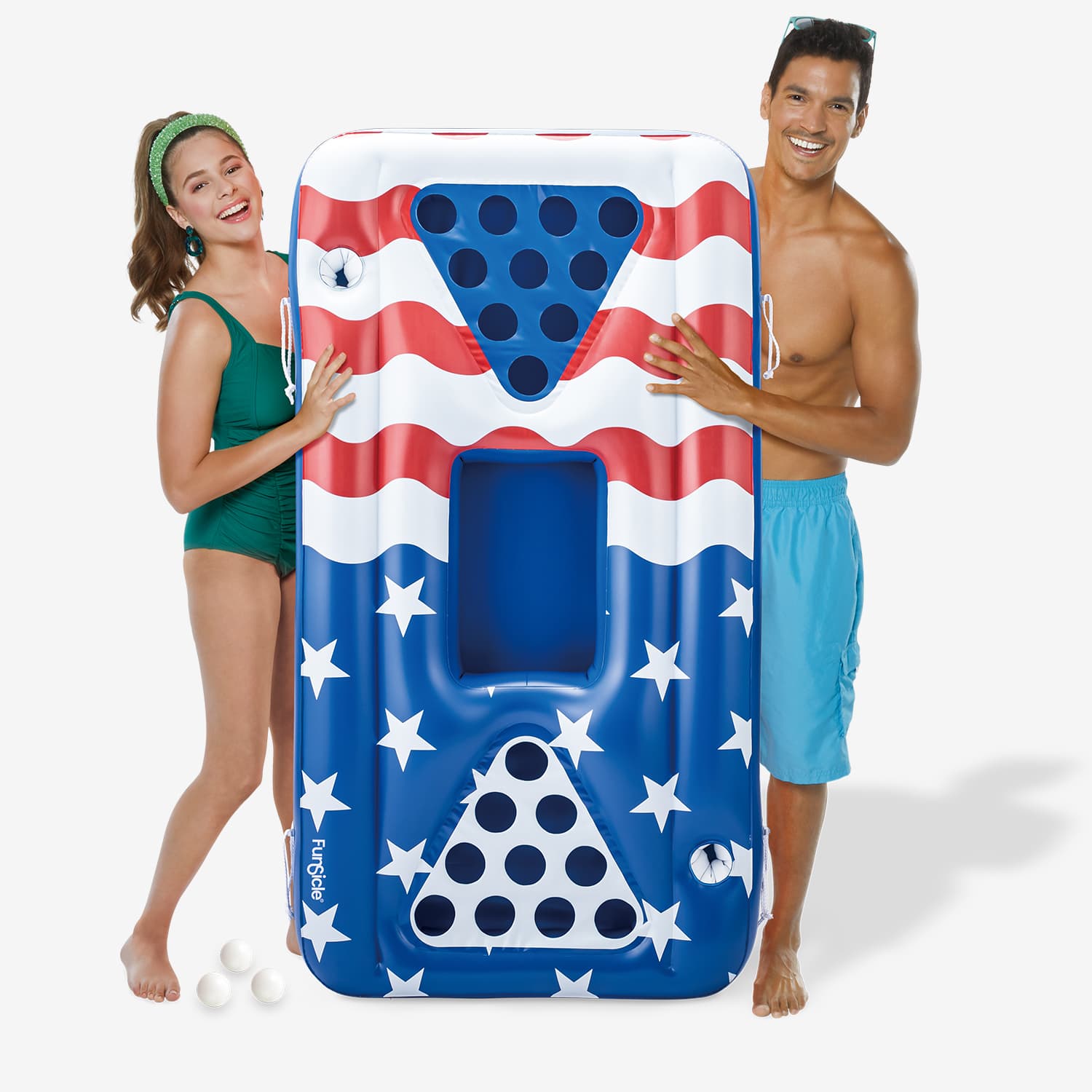 Two people holding an inflatable pool pong with American flag design