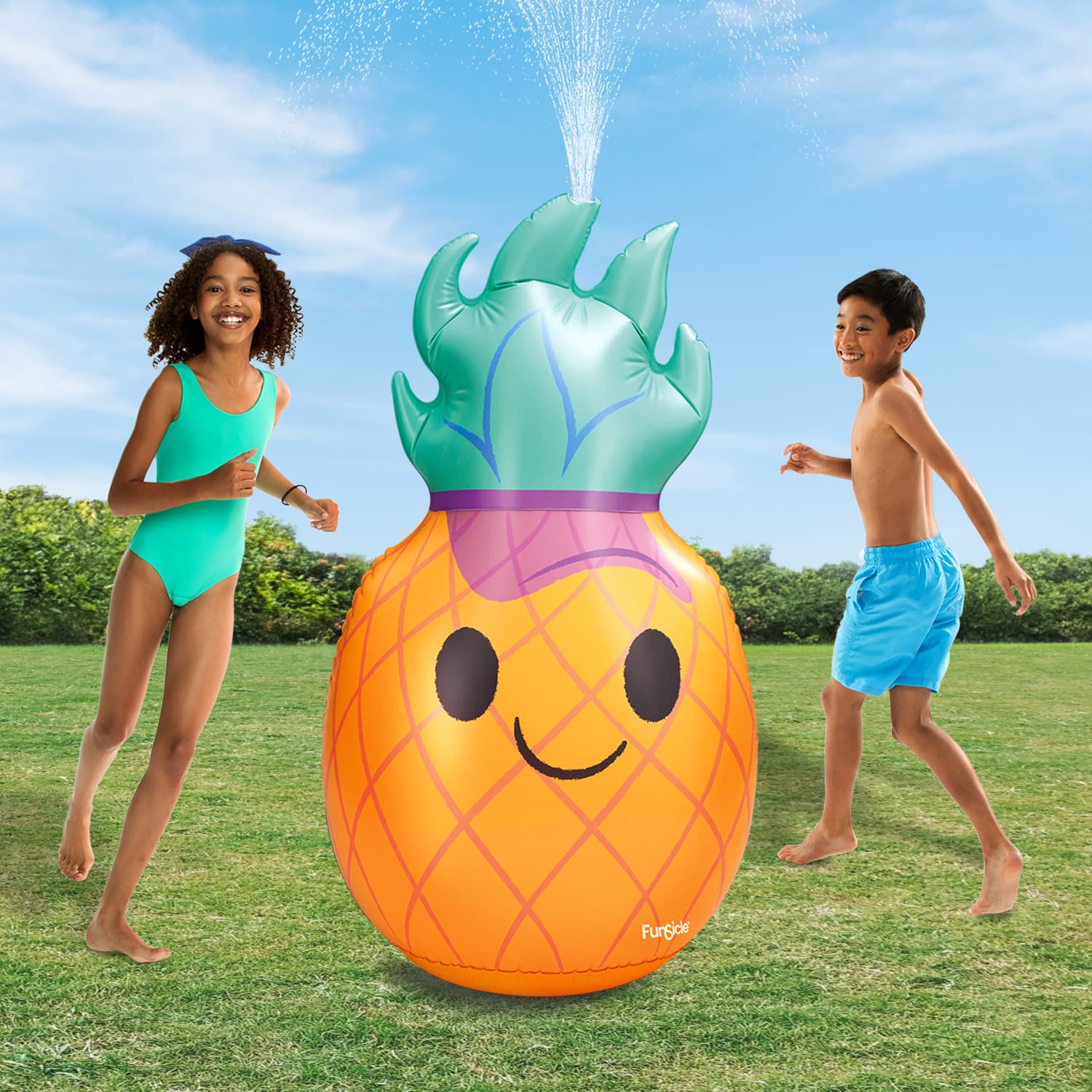 Funsicle Groovy Pineapple Sprinkler with two models around it on a grass background