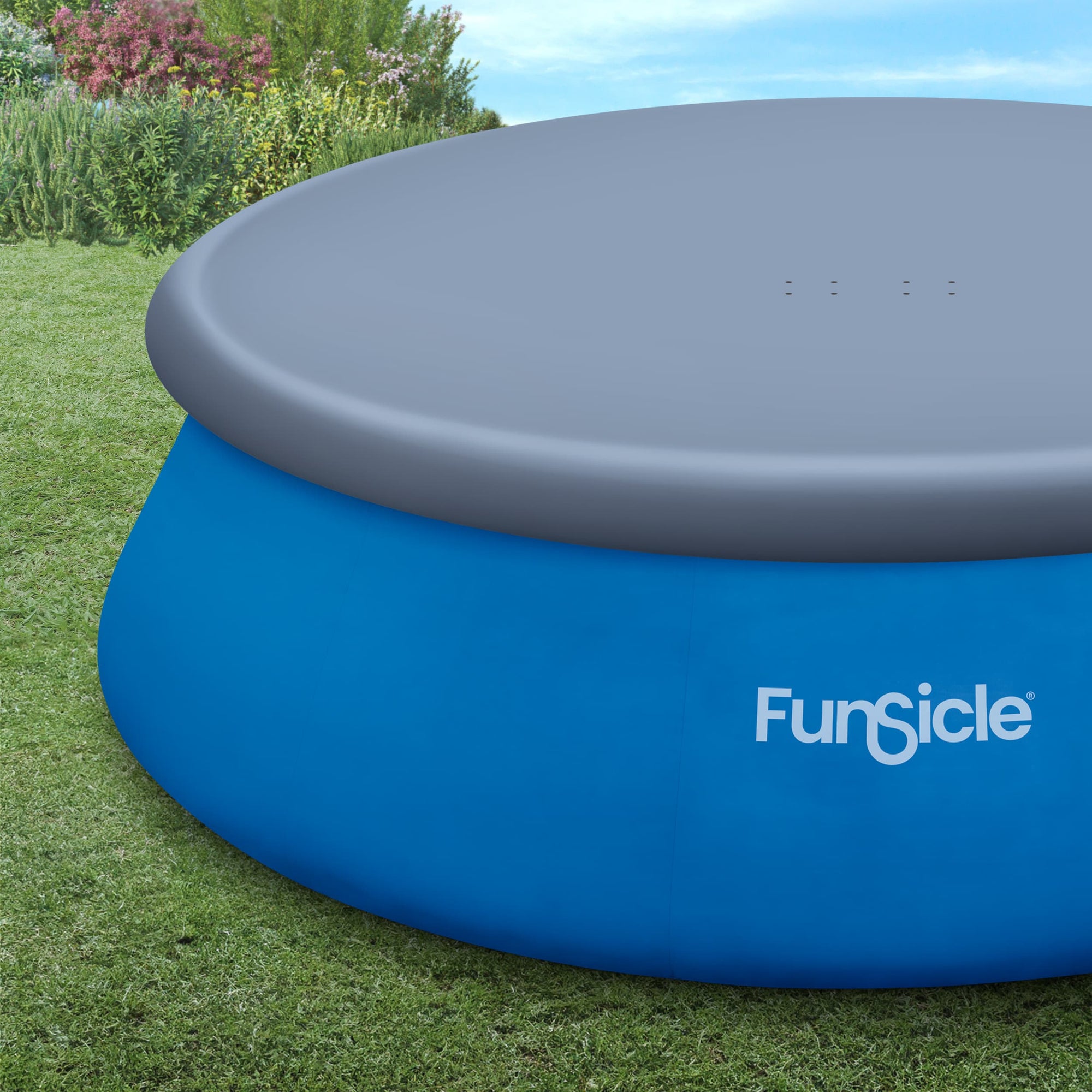 Funsicle 16ft QuickSet Pool Cover with Funsicle QuickSet Pool on a grass background