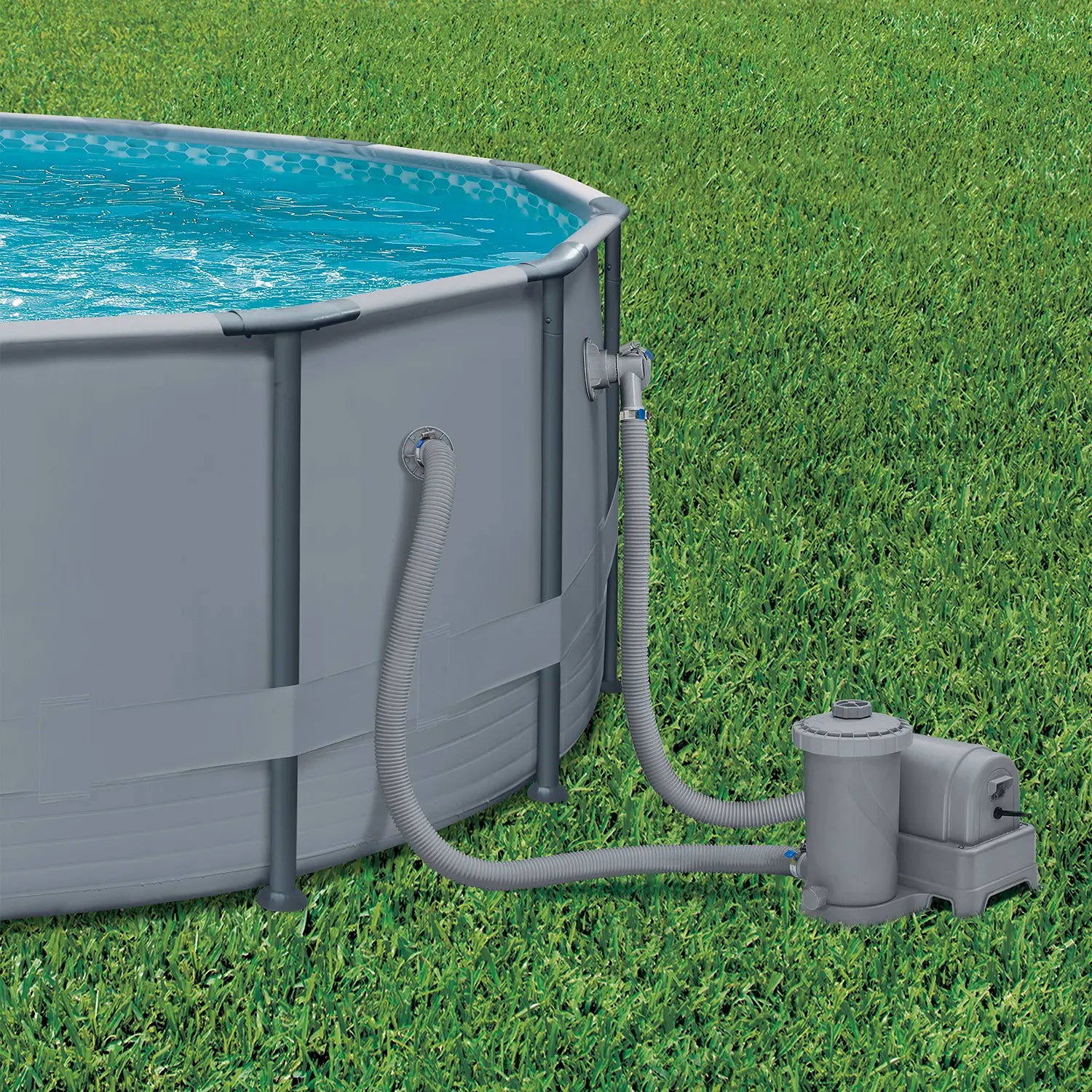 Funsicle CP2000 Cartridge Filter Pump attached to a gray pool on a grass background