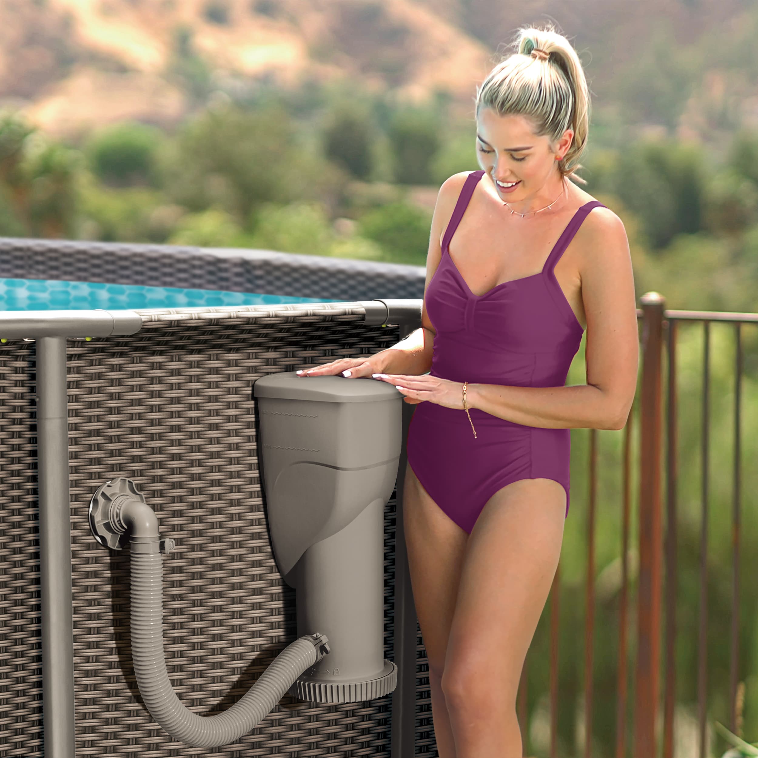 Funsicle SFX1500 SkimmerPlus Filter Pump attached to Funsicle Above Ground Pool with a model next to it