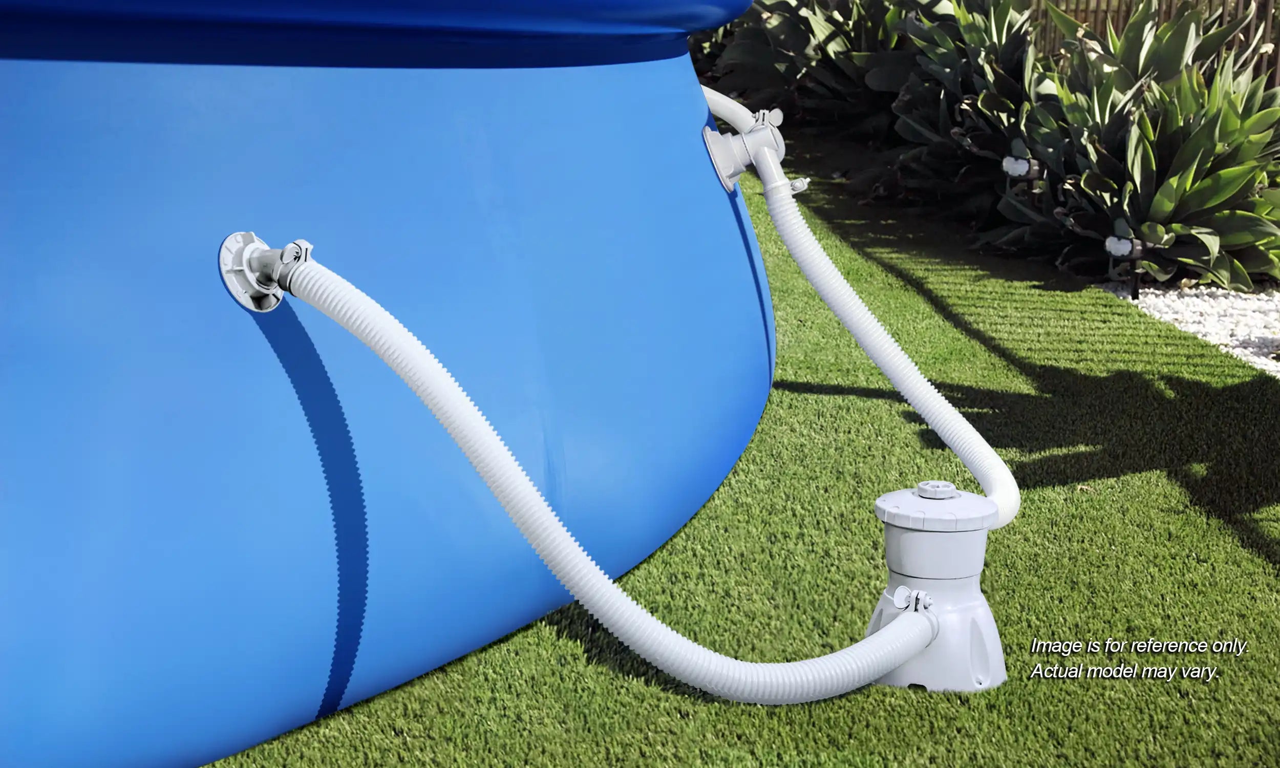 Funsicle RX330 Cartridge Filter Pump attached to a pool on grass ground