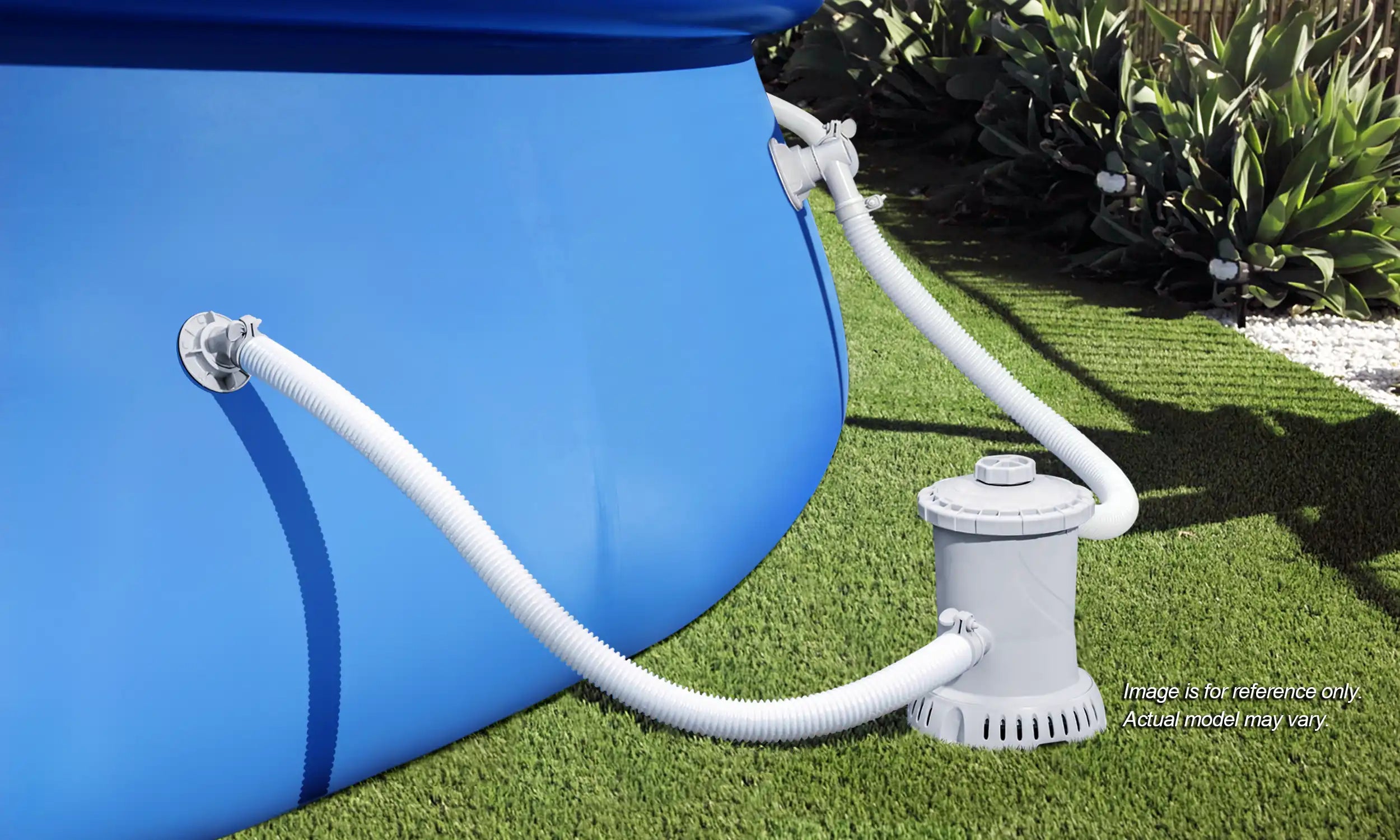 Funsicle RX600 Cartridge Filter Pump attached to a pool on a grass field