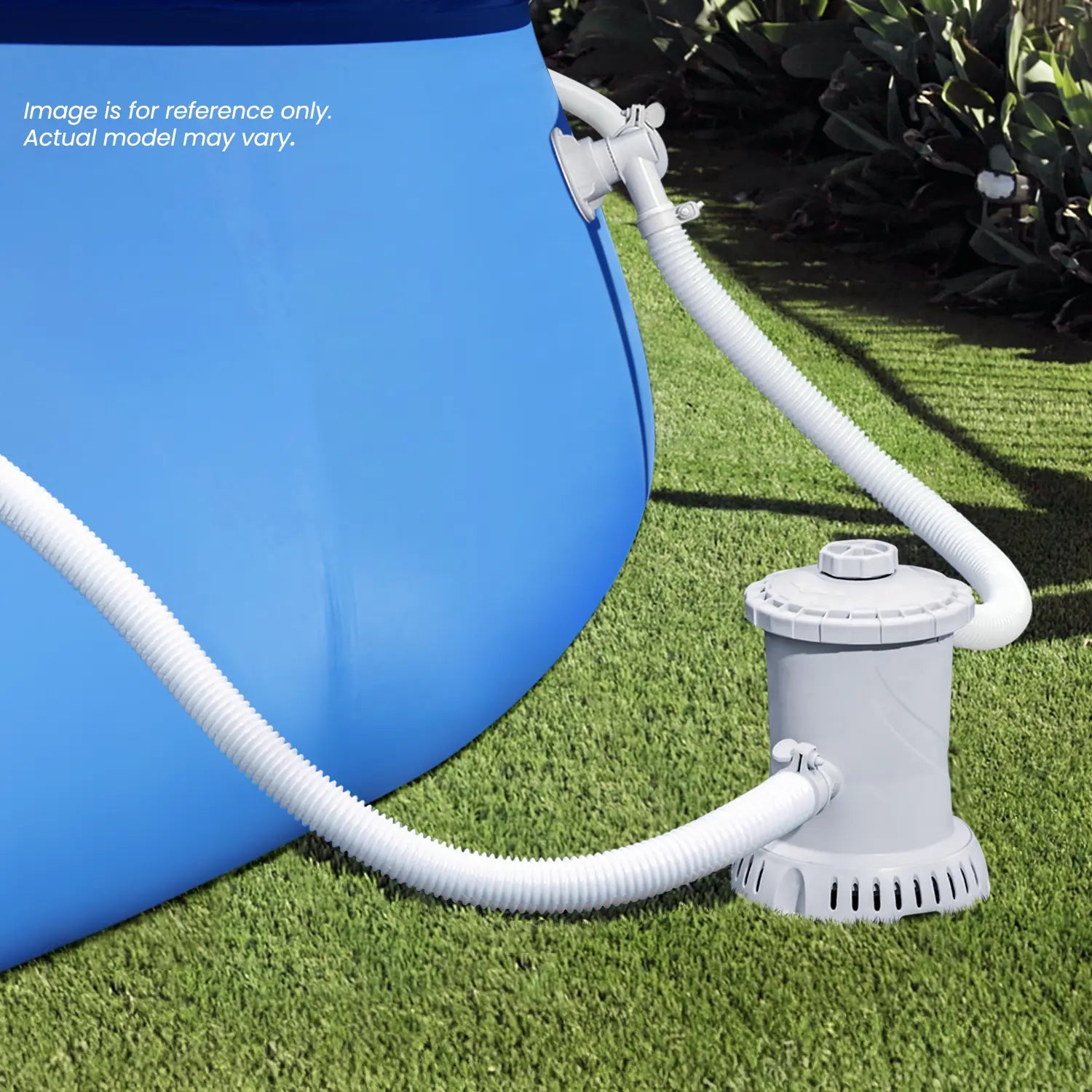 Funsicle RX600 Cartridge Filter Pump attached to a blue pool on a grass background