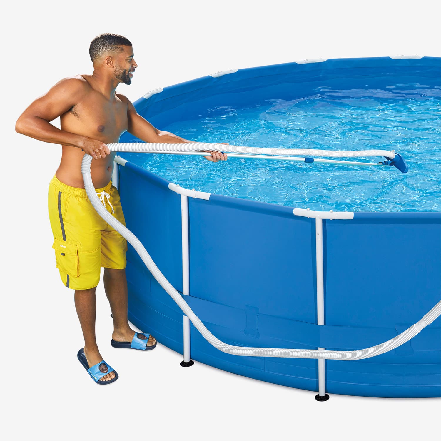 A model using Funsicle Deluxe Maintenance Kit to clean a pool