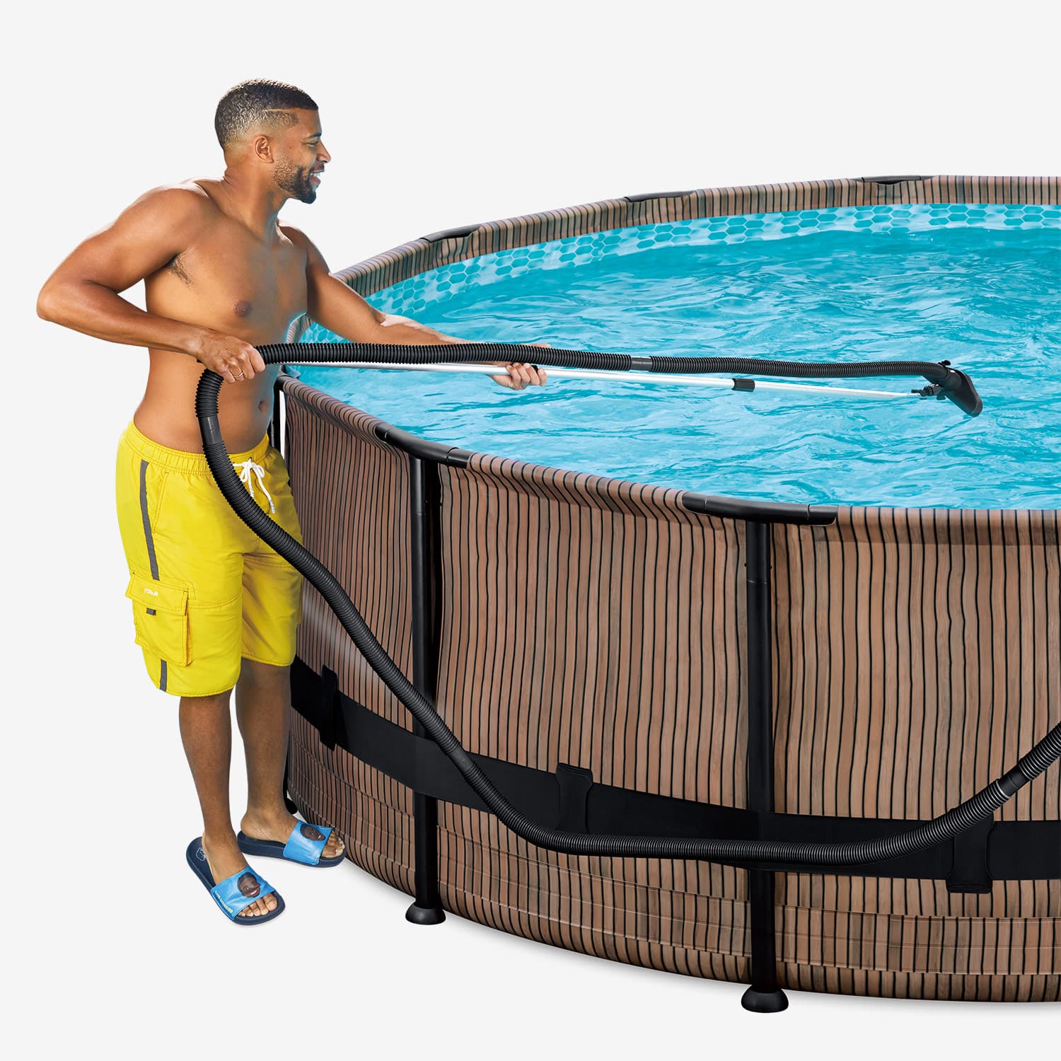 A model using Funsicle Deluxe Maintenance Kit to clean a pool