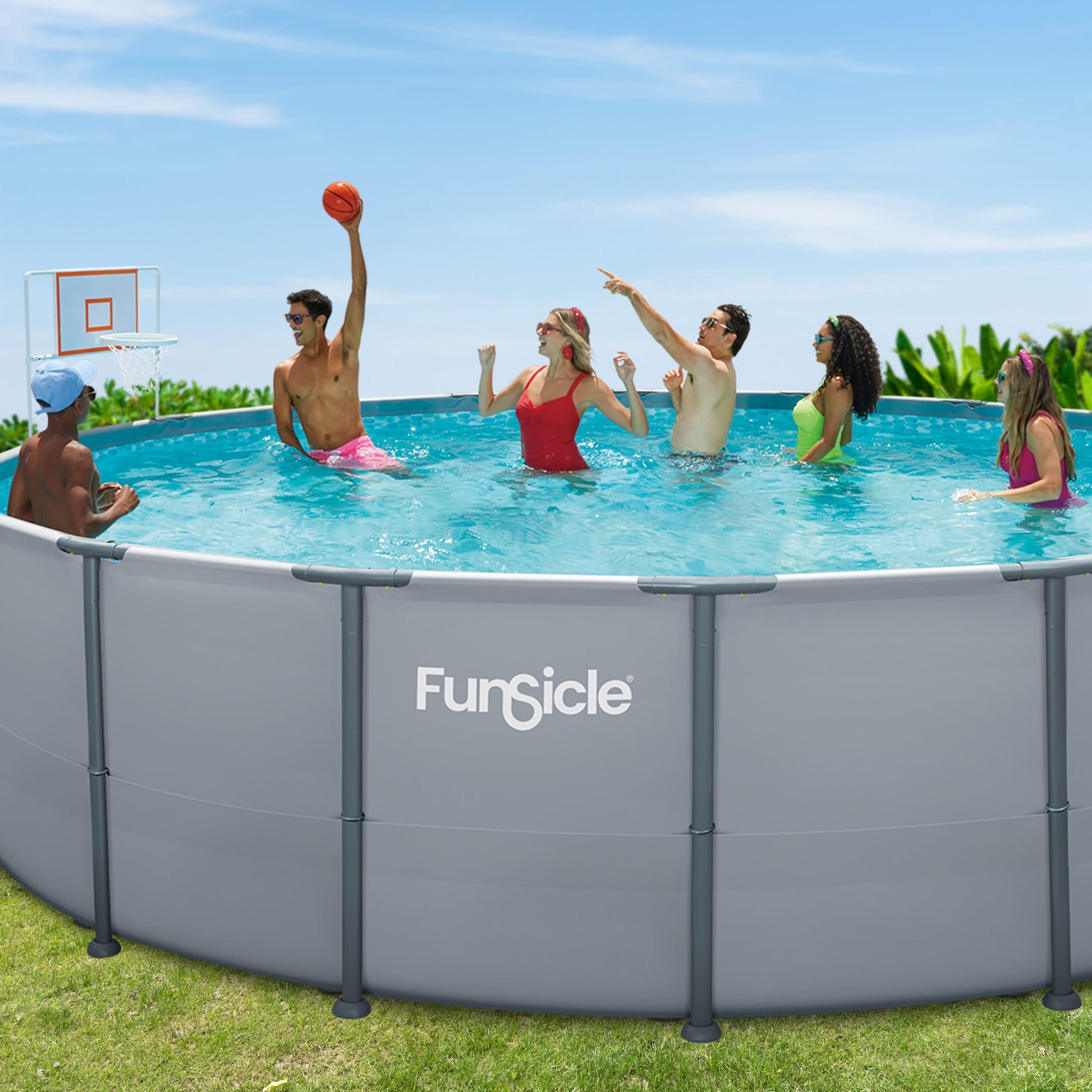 People playing basketball in a pool with a Funsicle pool in the foreground