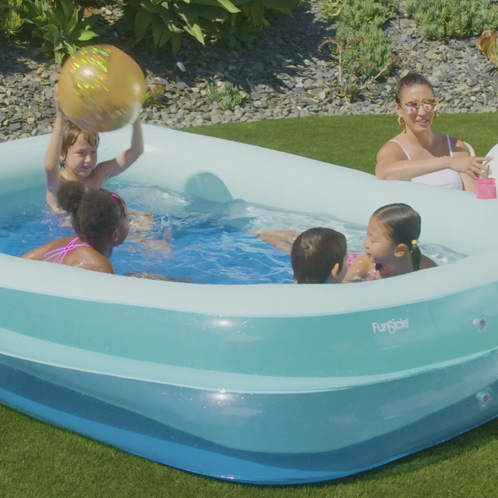 Kids playing in Funsicle SummerBlock Pool at a backyard